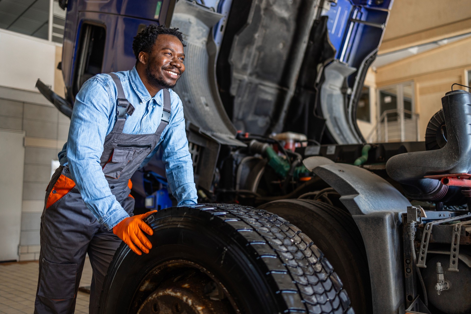 Changing truck wheel and tire repair.